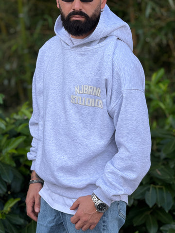 Felpa oversize cappuccio studios grigio new job brand
