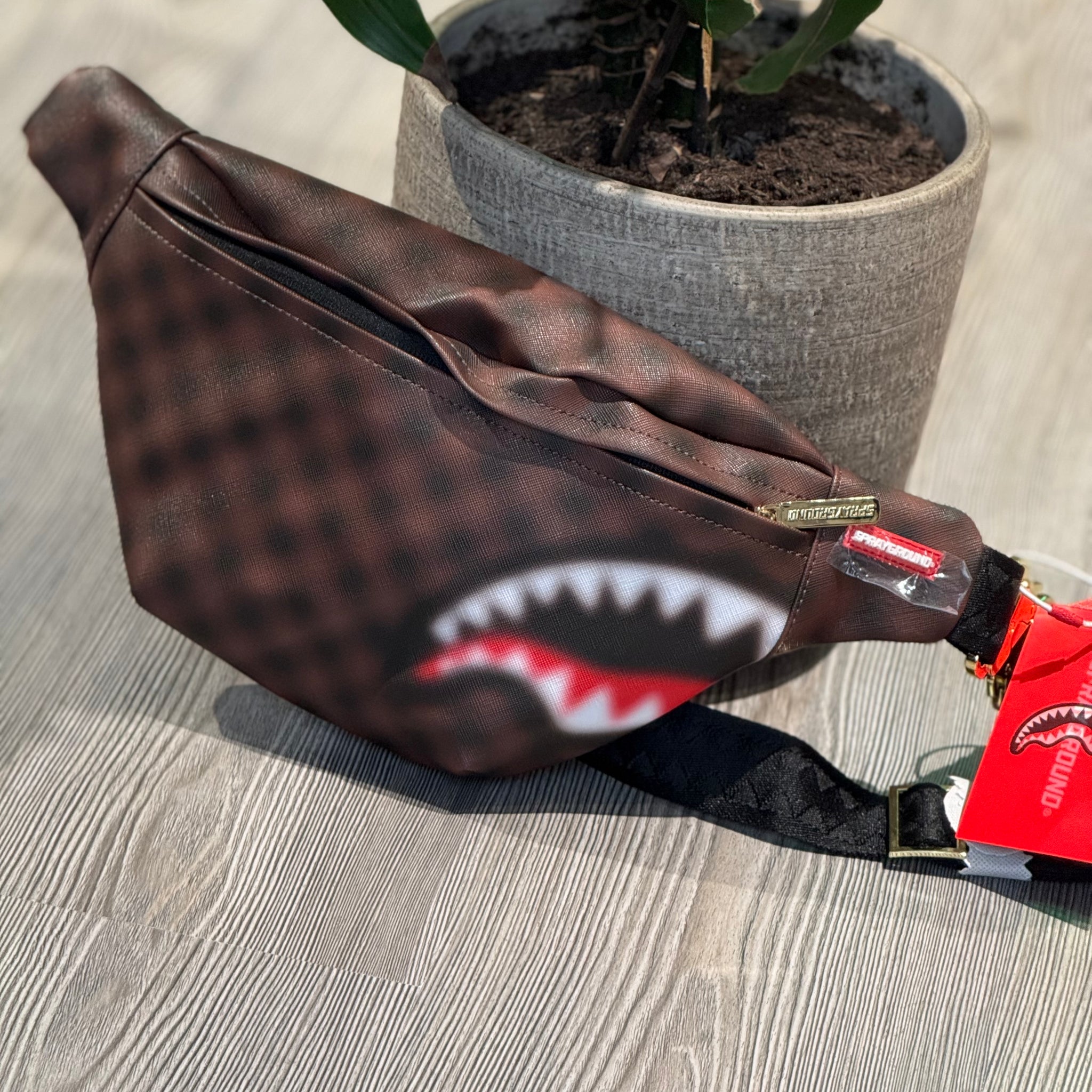 marsupio sprayground sharks